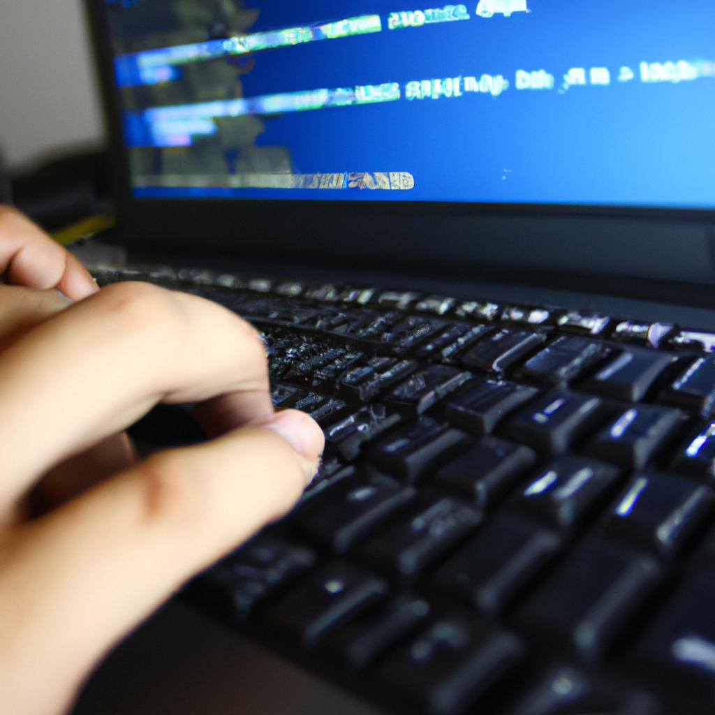 Person using computer, coding